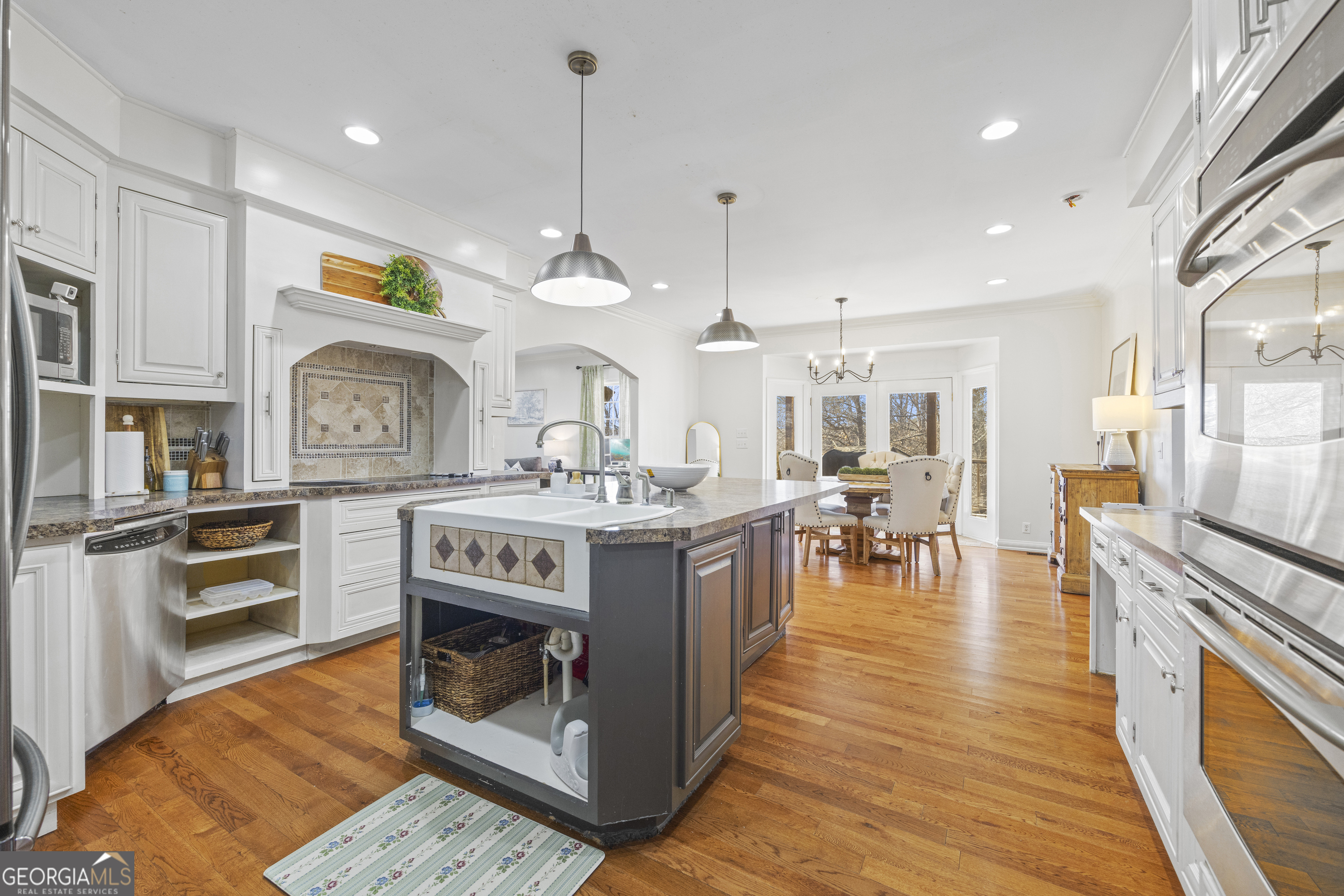 2565 New Franklin Church Road Canon, GA 30520 - Photo 55 of 168 a kitchen with stainless steel appliances granite countertop a stove and cabinets
