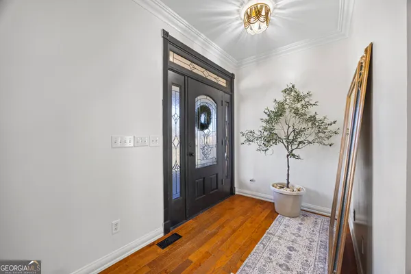 a bath tub sitting next to a window