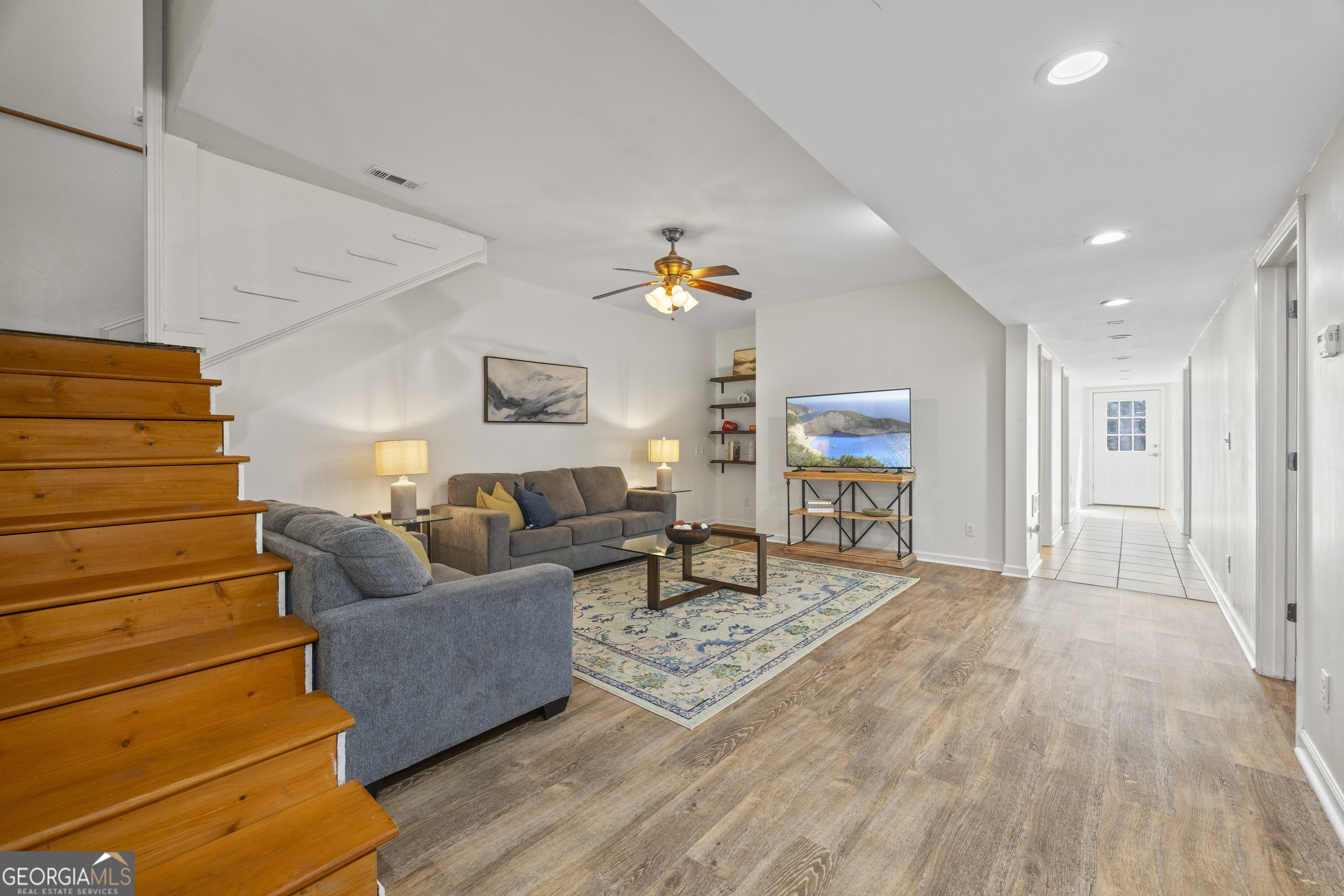 2565 New Franklin Church Road Canon, GA 30520 - Photo 80 of 168 a living room with furniture and a wooden floor