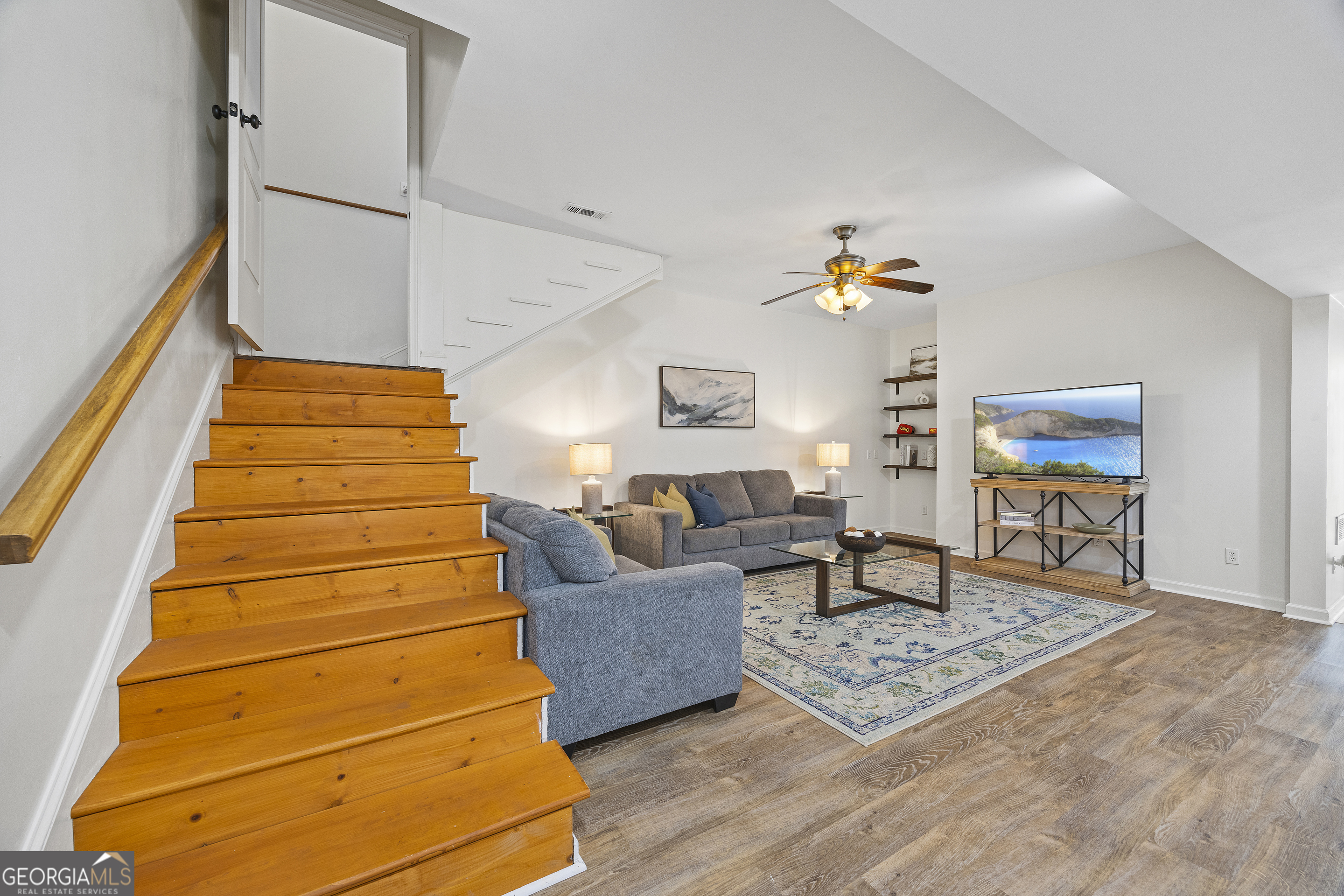 2565 New Franklin Church Road Canon, GA 30520 - Photo 81 of 168 a living room with furniture and wooden floor