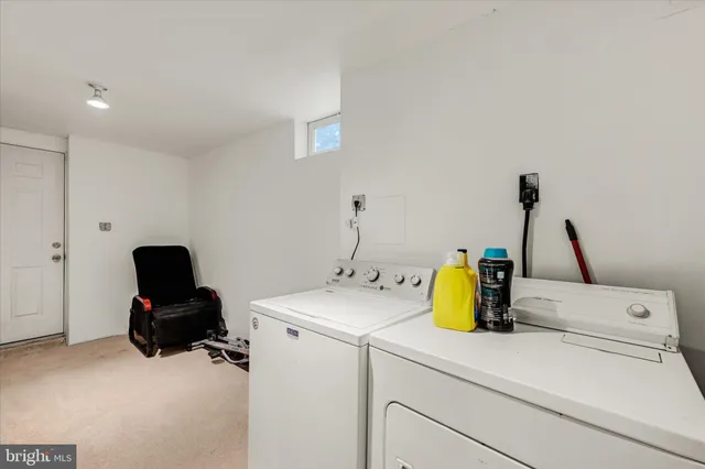 a view of outdoor space with seating and trees