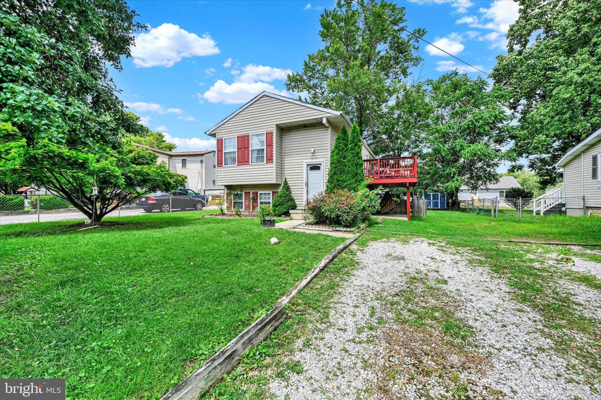 2838 Pennsylvania Avenue Baltimore, MD 21227 - Photo 3 of 32 a house view with a garden space