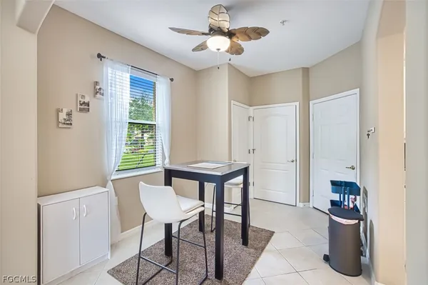 a view of a room with furniture window and a chandelier