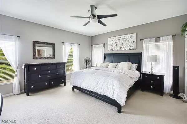 a bedroom with a bed and a closet