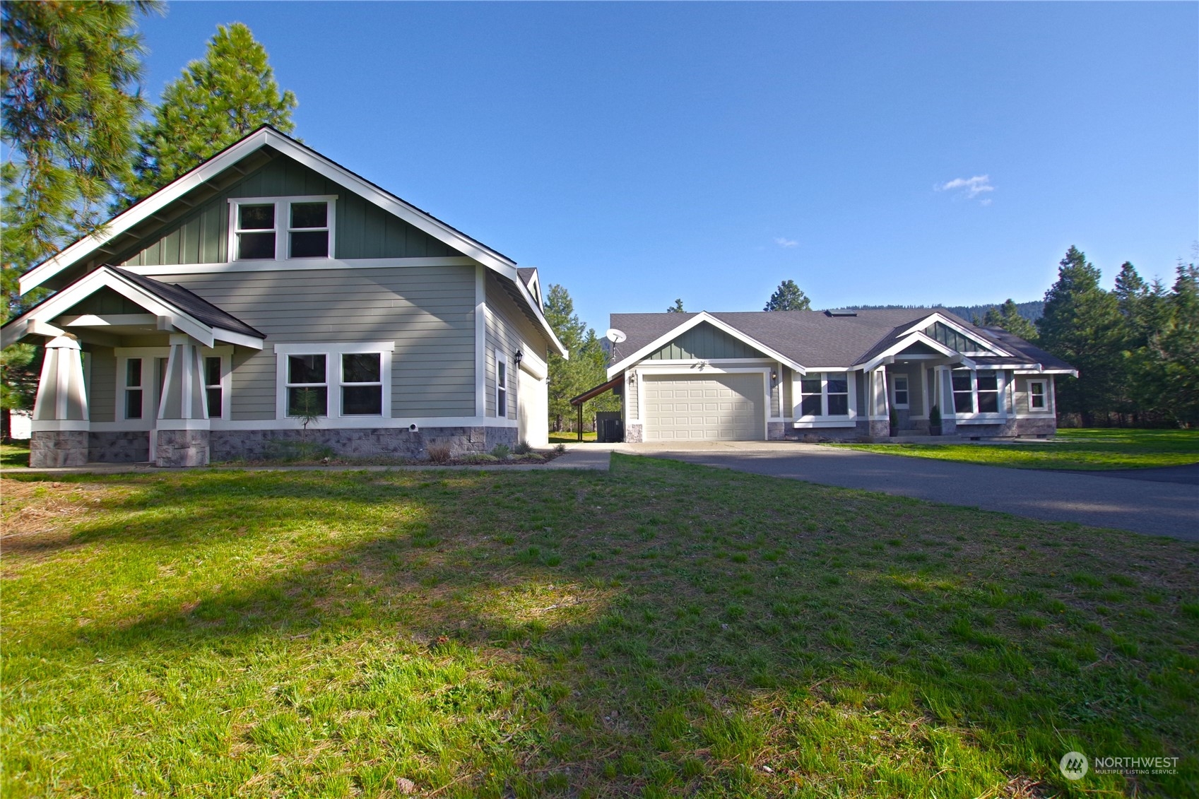 551 Old Cedars Road Cle Elum, WA 98922 - Photo 1 of 39 a front view of house with yard and green space
