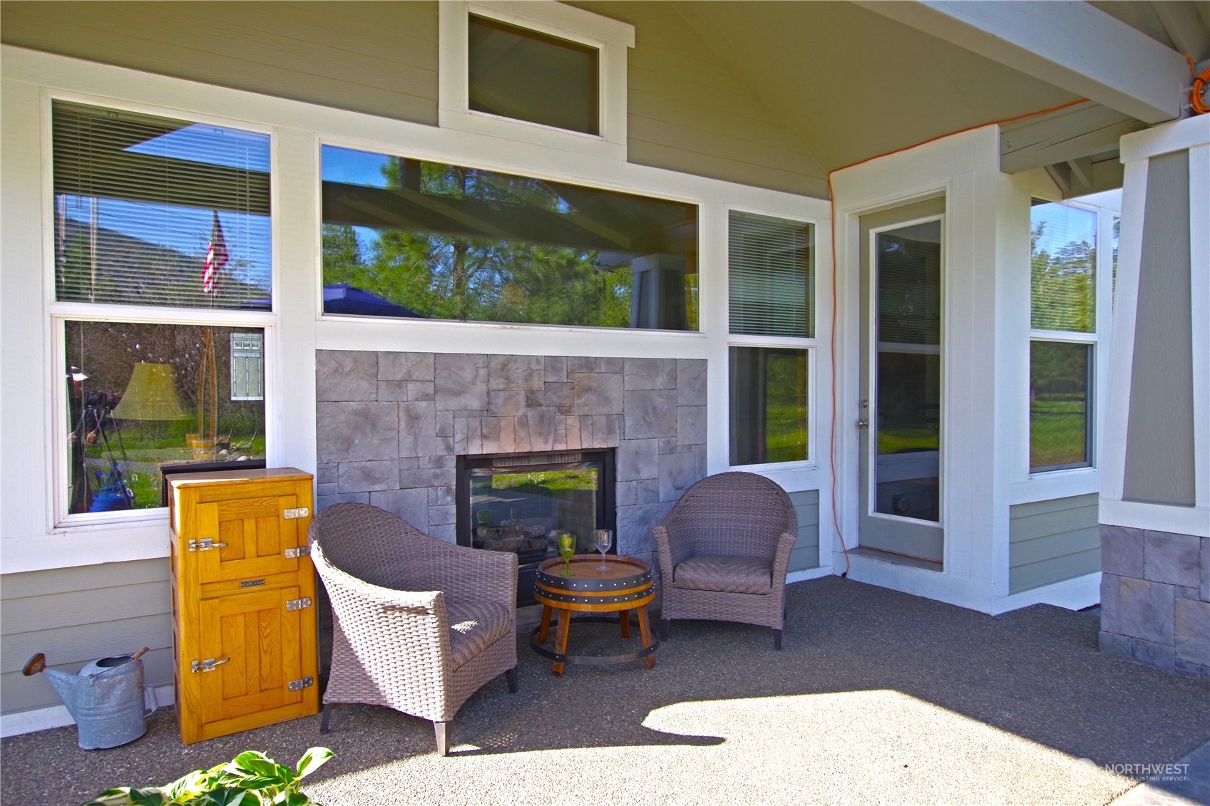 551 Old Cedars Road Cle Elum, WA 98922 - Photo 36 of 39 a building outdoor space with patio furniture and potted plants