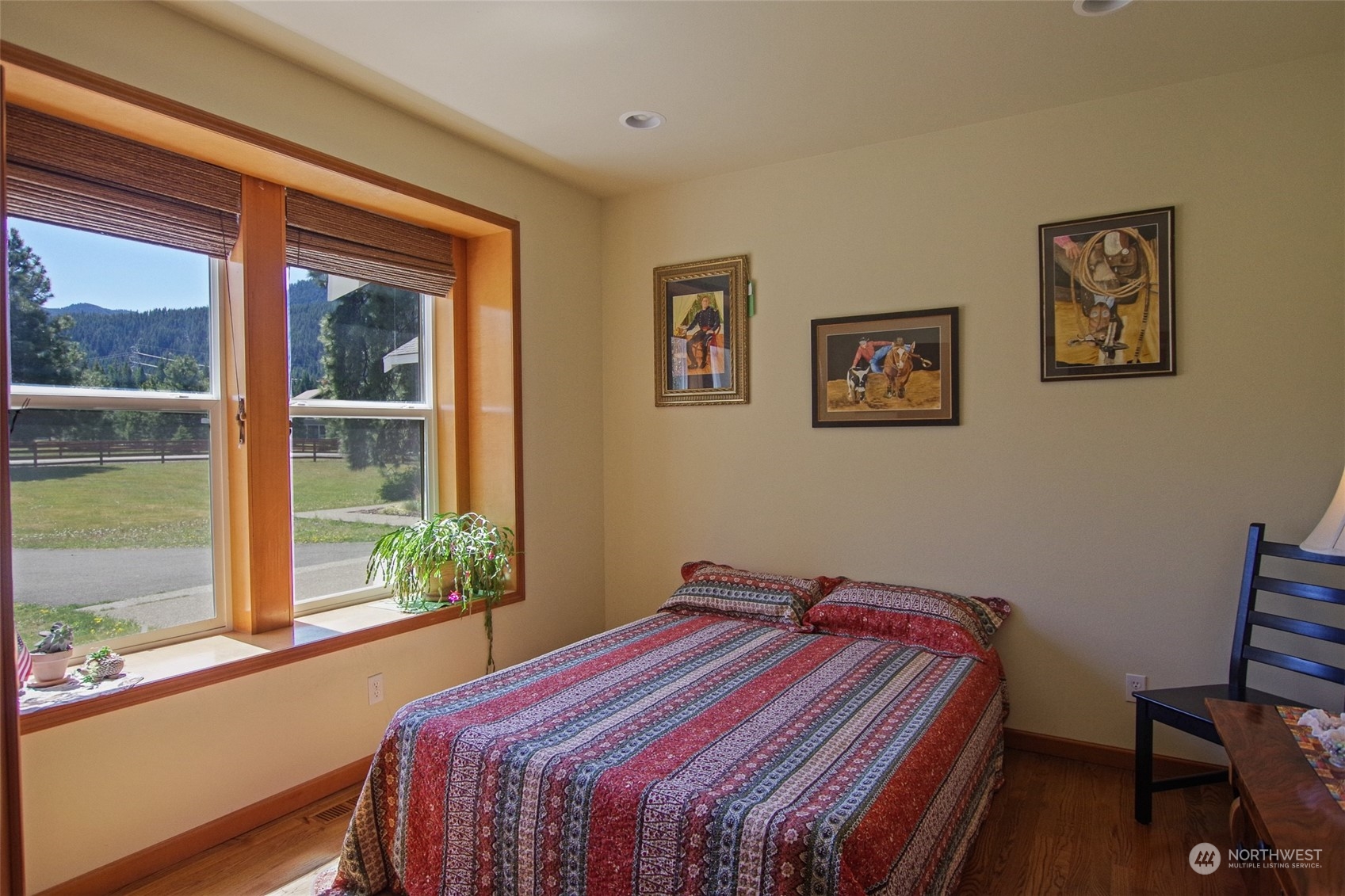 551 Old Cedars Road Cle Elum, WA 98922 - Photo 8 of 39 a bedroom with a bed and a window