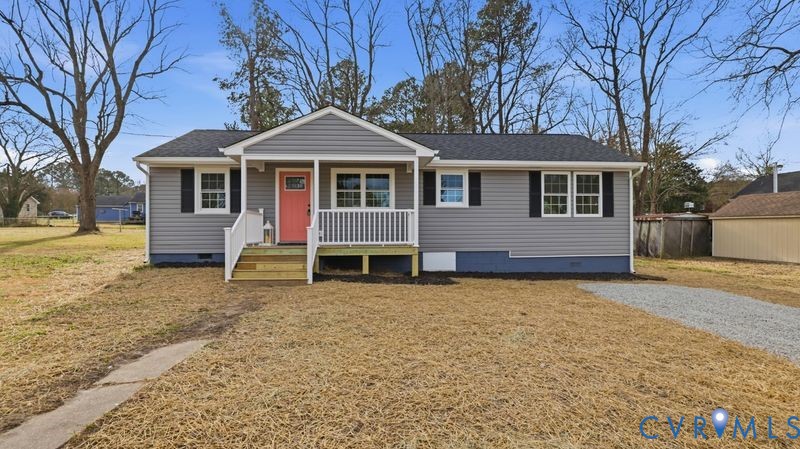 25209 Ritchie Avenue Petersburg, VA 23803 - Photo 46 of 50 a front view of a house with a yard