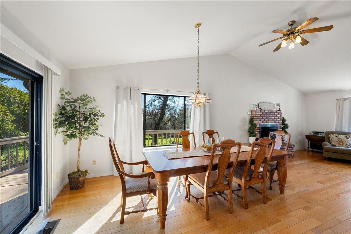13936 Oak Ridge Road Penn Valley, CA 95946 - Photo 20 of 83 a view of a dining room with furniture window and outside view