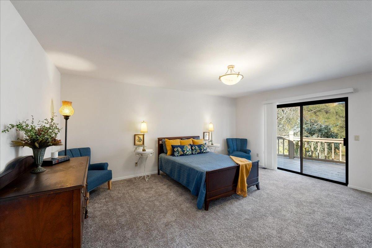 13936 Oak Ridge Road Penn Valley, CA 95946 - Photo 28 of 83 a bedroom with furniture and a window