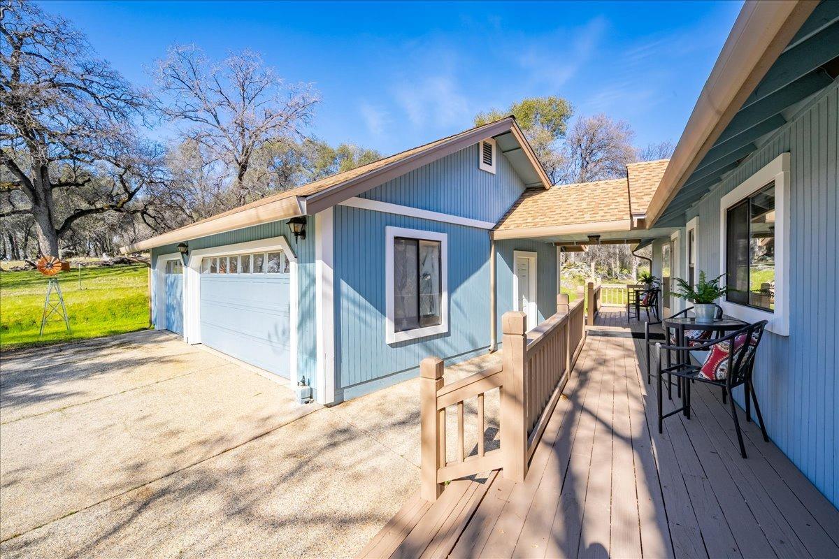 13936 Oak Ridge Road Penn Valley, CA 95946 - Photo 5 of 83 a view of a house with backyard and sitting area