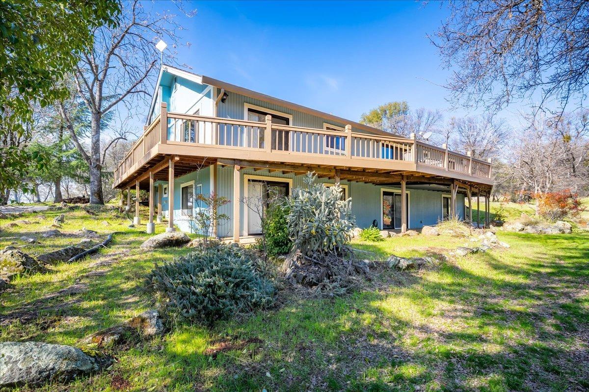 13936 Oak Ridge Road Penn Valley, CA 95946 - Photo 51 of 83 a front view of a house with a yard