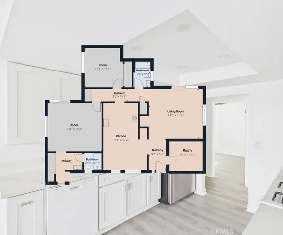 a kitchen with stainless steel appliances a refrigerator and white cabinets