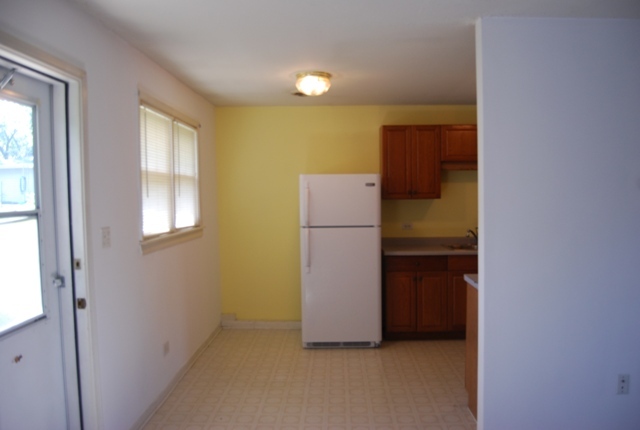 1805 West Southmor Road Morris, IL 60450 - Photo 6 of 13 a view of a room with a refrigerator and window