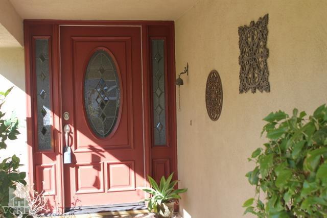 885 Erringer Road Simi Valley, CA 93065 - Photo 5 of 31 a front view of a house with garden