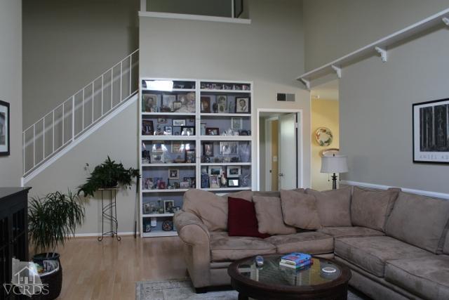 885 Erringer Road Simi Valley, CA 93065 - Photo 8 of 31 a living room with furniture and a potted plant