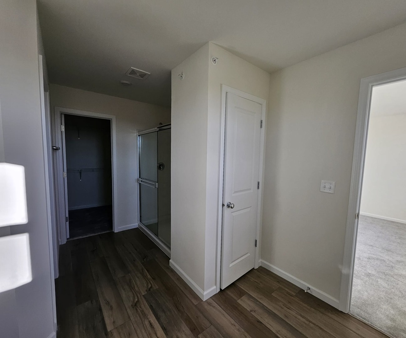 2212 Horseshoe Circle, Unit 2212 Plainfield, IL 60585 - Photo 11 of 12 a view of hallway with wooden floor