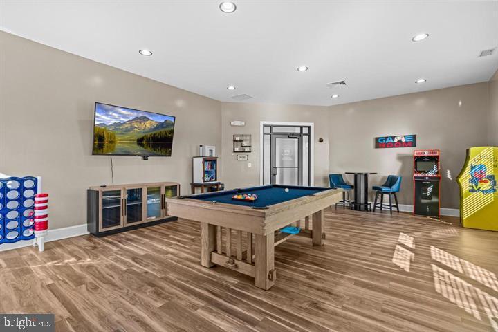 3111 Potters Hill Road Hanover, MD 21076 - Photo 39 of 40 a living room with furniture a flat screen tv and a table