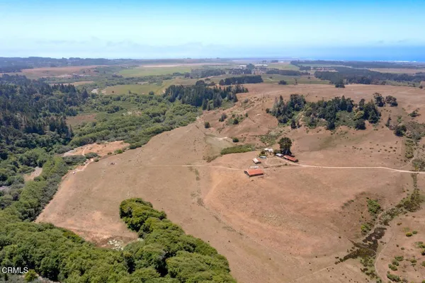 a view of beach and ocean