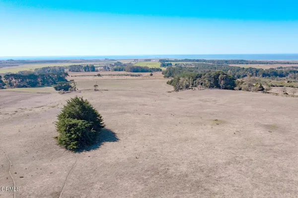 an outdoor view with two chairs