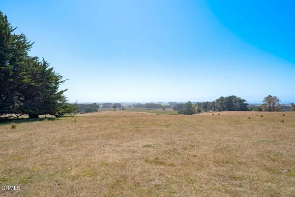 an aerial view of beach and city