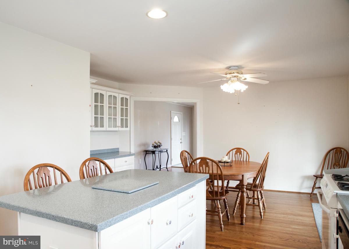 203 Bynum Ridge Road Forest Hill, MD 21050 - Photo 9 of 21 a dining room with furniture and wooden floor