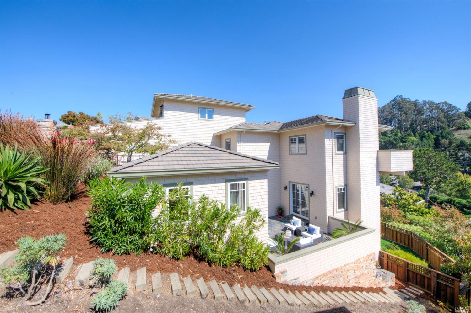 22 Vista Real Mill Valley, CA 94941 - Photo 1 of 1 a front view of a house with garden