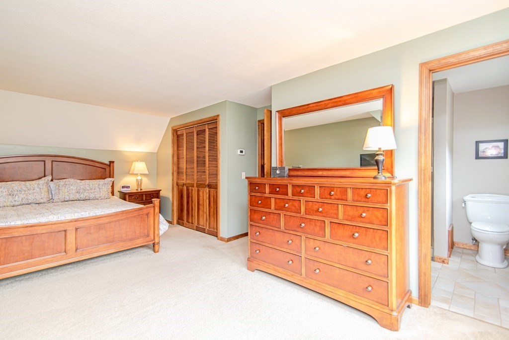 246 Mountain Road Wilbraham, MA 01095 - Photo 24 of 40 a bedroom with a bed and a dresser
