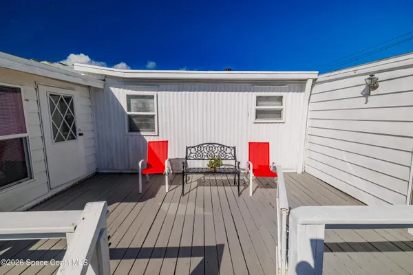 a view of an outdoor space and tennis court