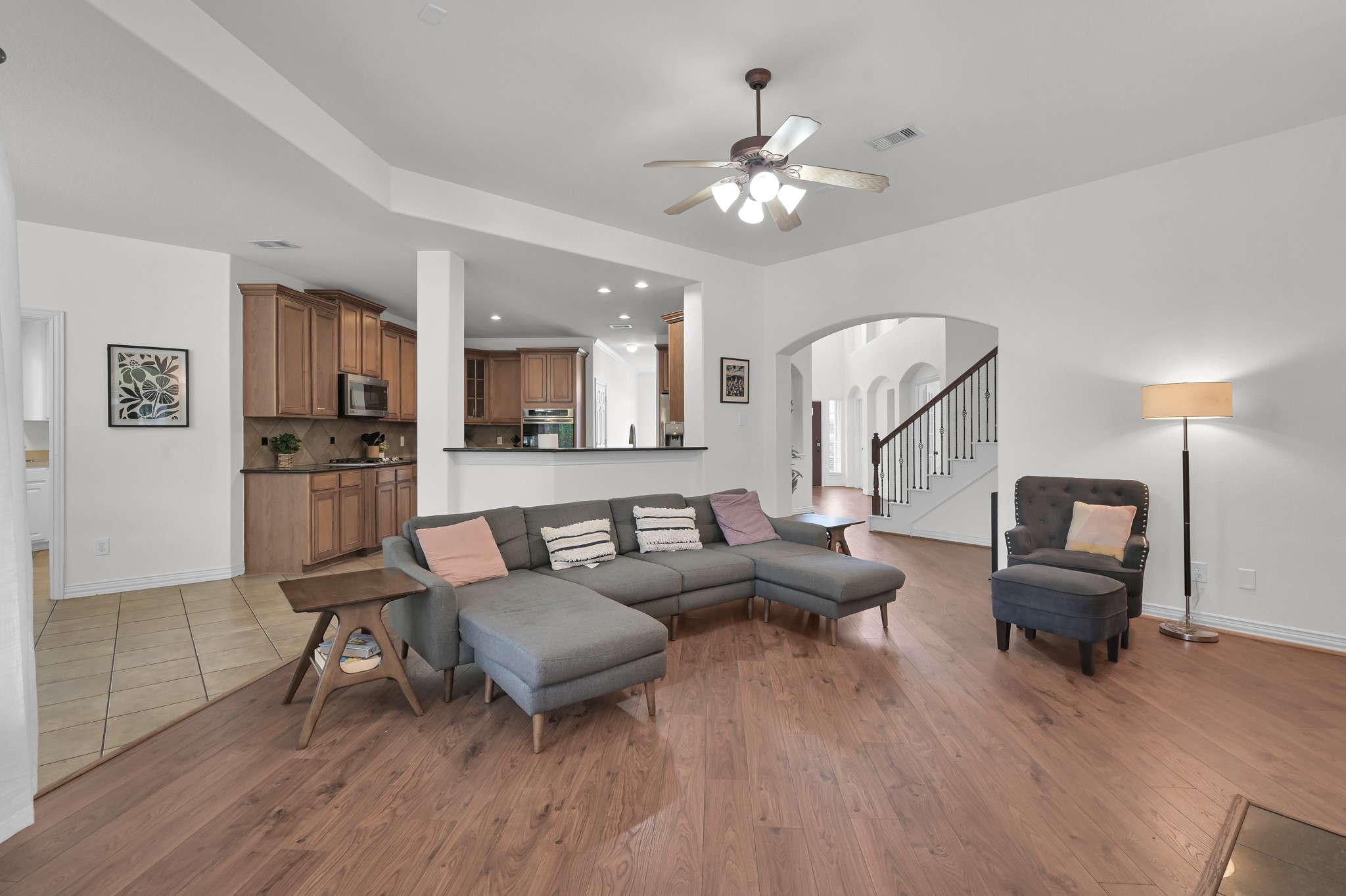 4770 Jackson Square Drive Conroe, TX 77304 - Photo 12 of 48 a living room with furniture and a wooden floor