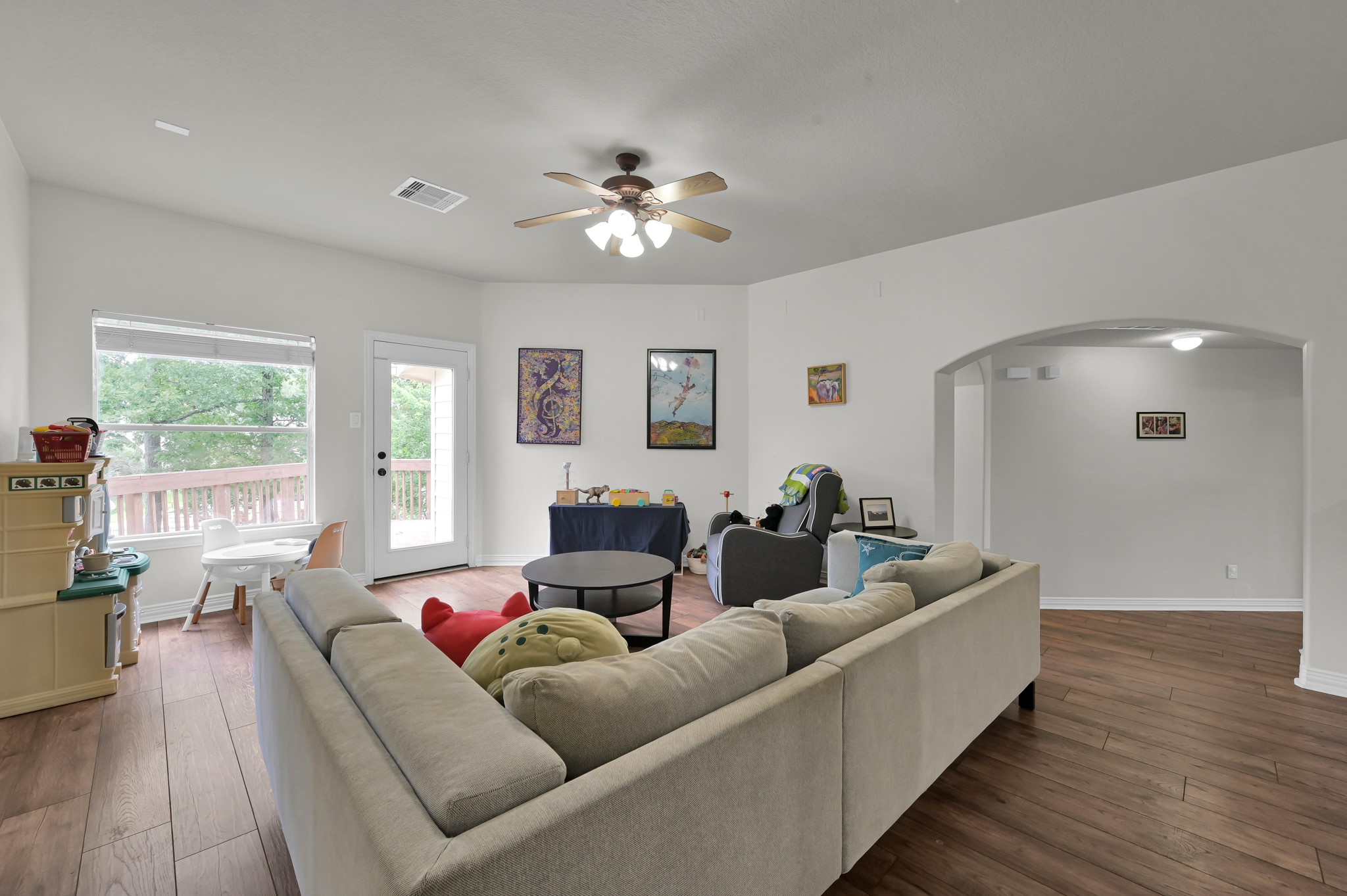 4770 Jackson Square Drive Conroe, TX 77304 - Photo 24 of 48 a living room with furniture and a large window