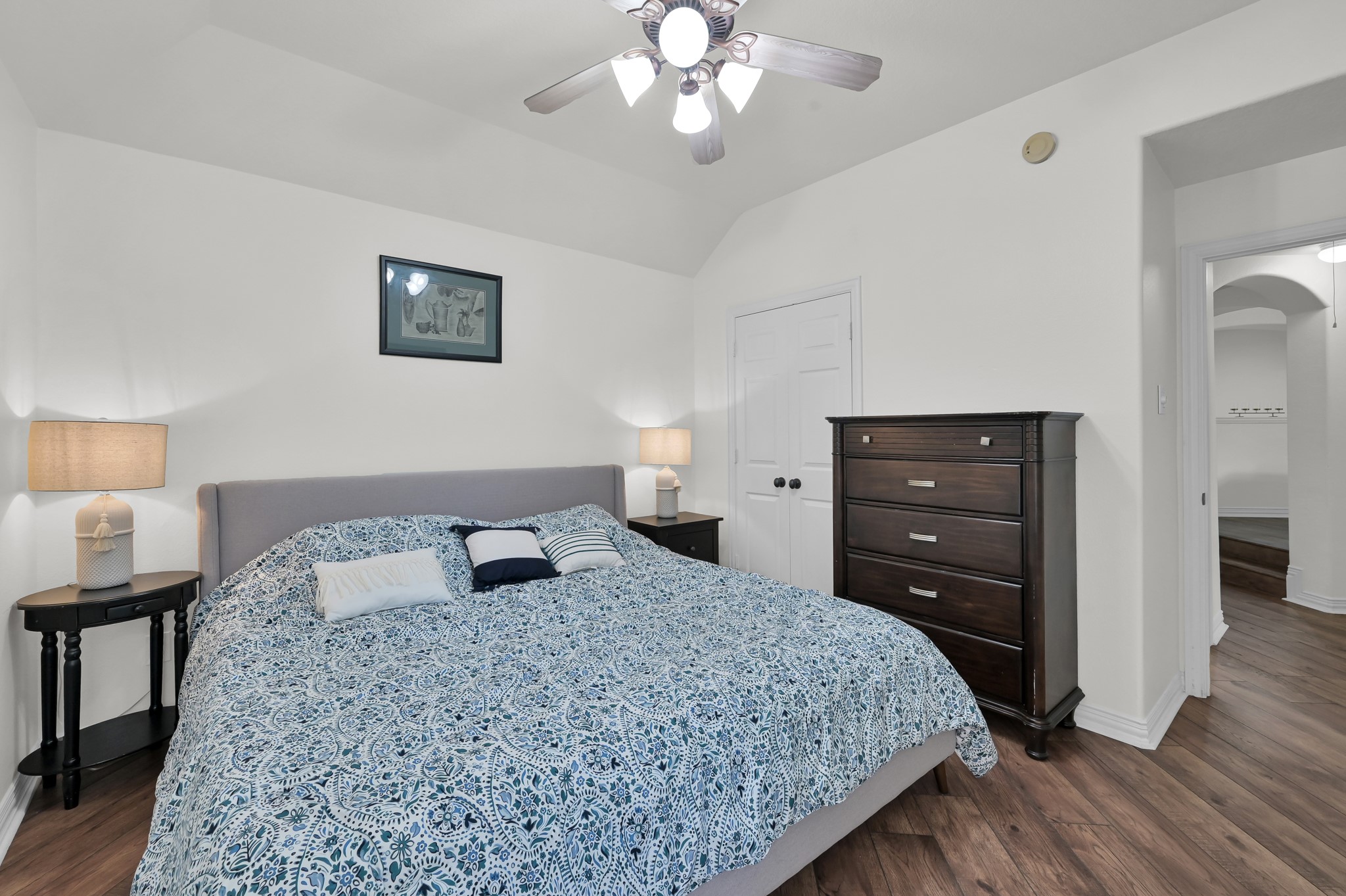 4770 Jackson Square Drive Conroe, TX 77304 - Photo 31 of 48 a bedroom with a bed and a lamp