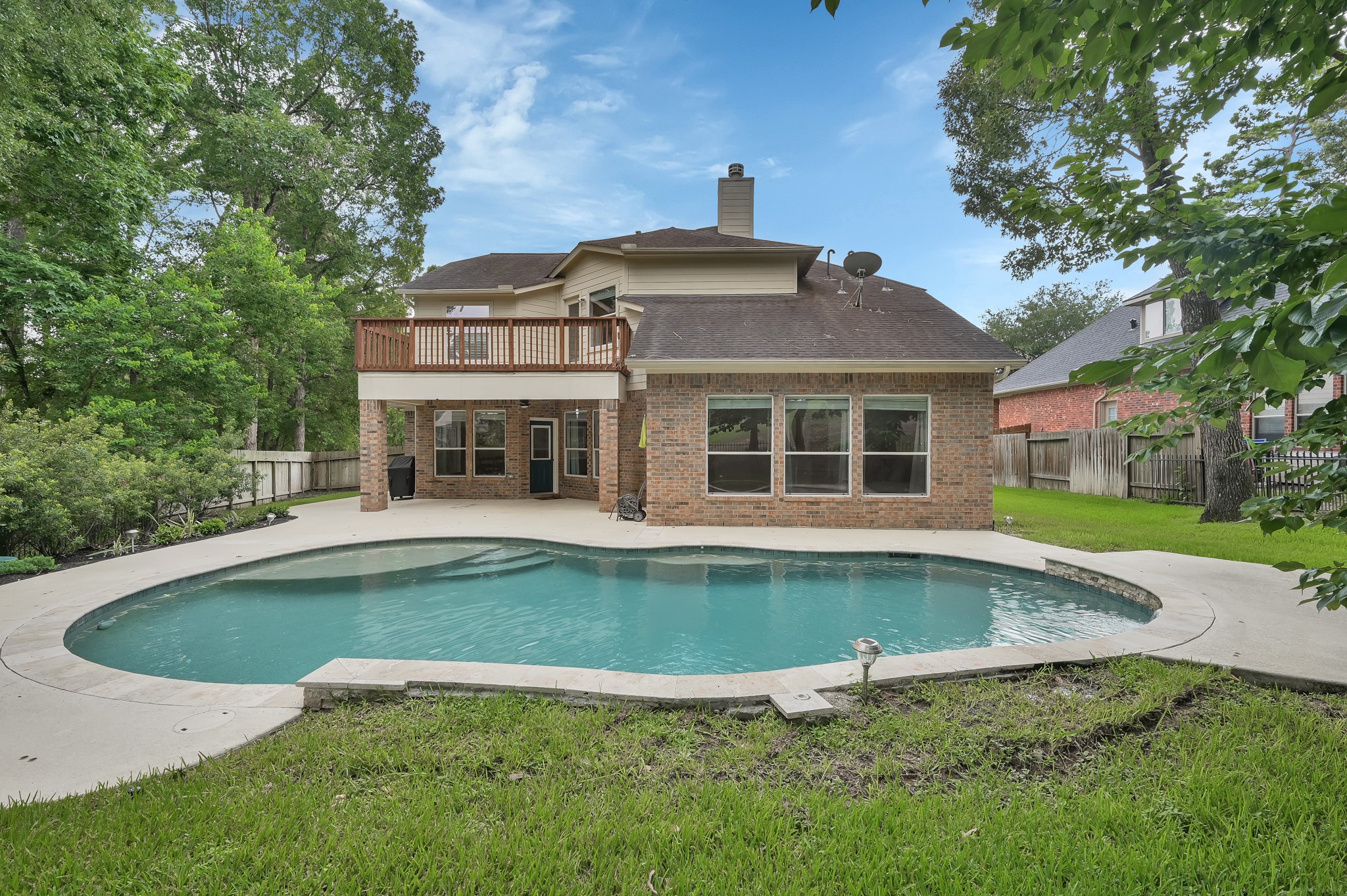 4770 Jackson Square Drive Conroe, TX 77304 - Photo 42 of 48 a view of pool with outdoor seating and yard