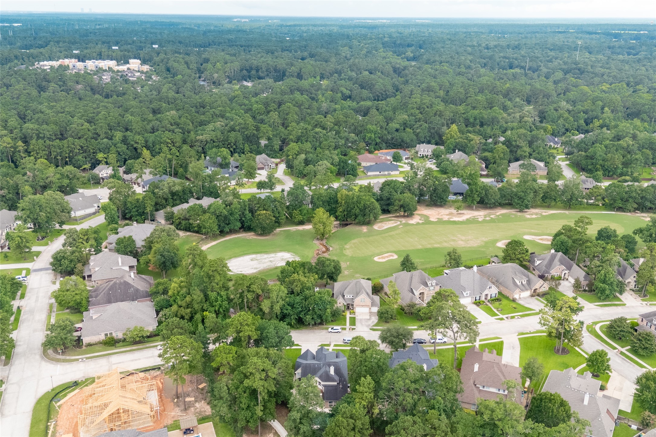 4770 Jackson Square Drive Conroe, TX 77304 - Photo 47 of 48 an aerial view of a house with yard swimming pool and lake view