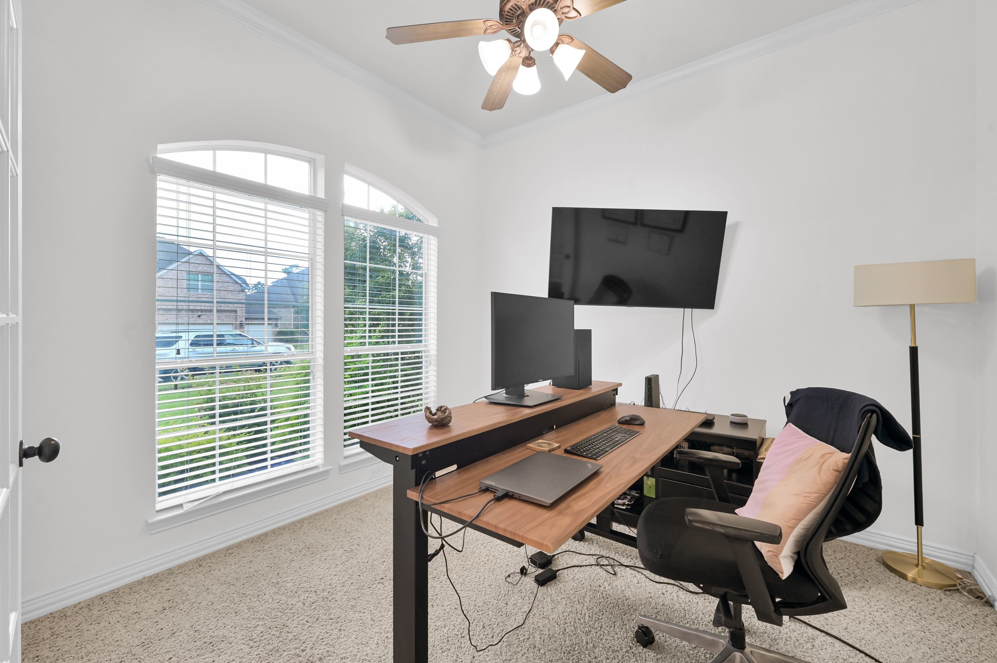 4770 Jackson Square Drive Conroe, TX 77304 - Photo 5 of 48 a view of a workspace with furniture and a window