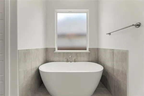 a bathroom with a bathtub
