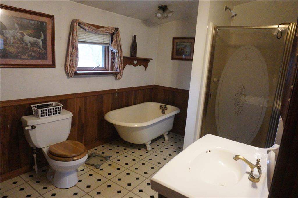 320 Sawmill Road Greensburg, PA 15601 - Photo 13 of 25 Master Bath with stand up shower and claw foot tub