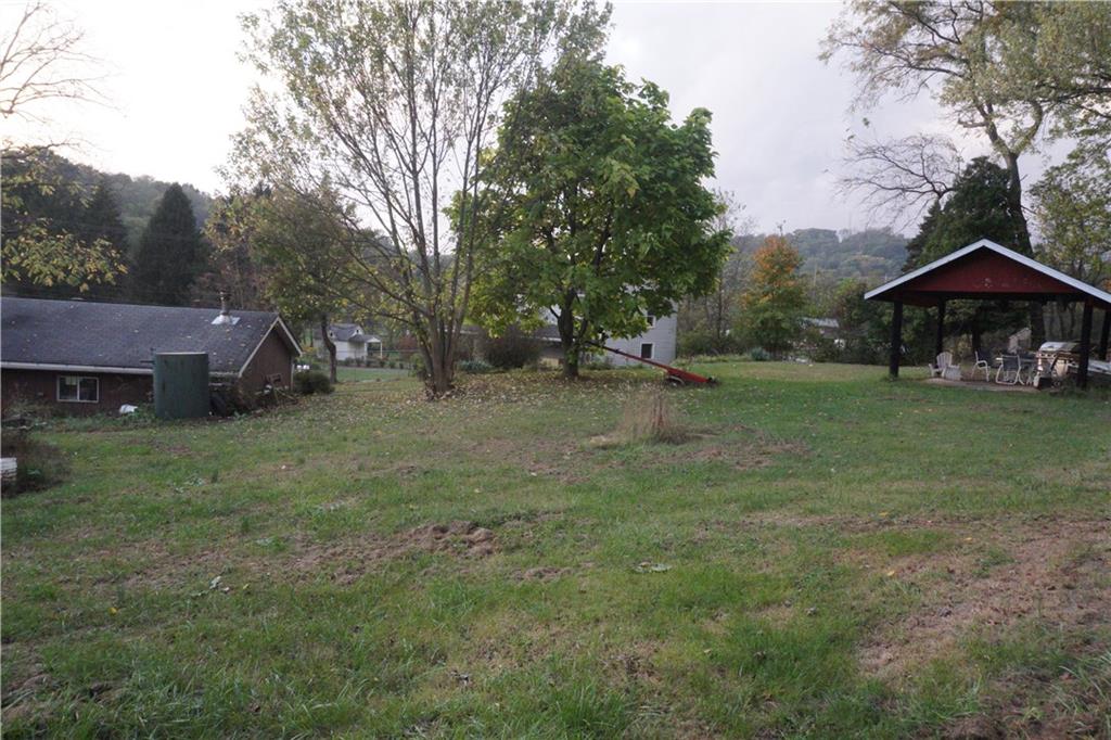 320 Sawmill Road Greensburg, PA 15601 - Photo 19 of 25 View from Horse shoe pit area... view of pavilion and top of home