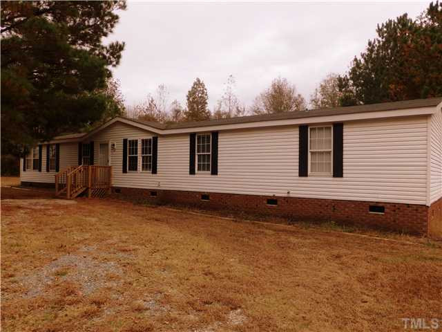 295 Massengill Pond Road Angier, NC 27501 - Photo 25 of 25 a view of a house with a backyard