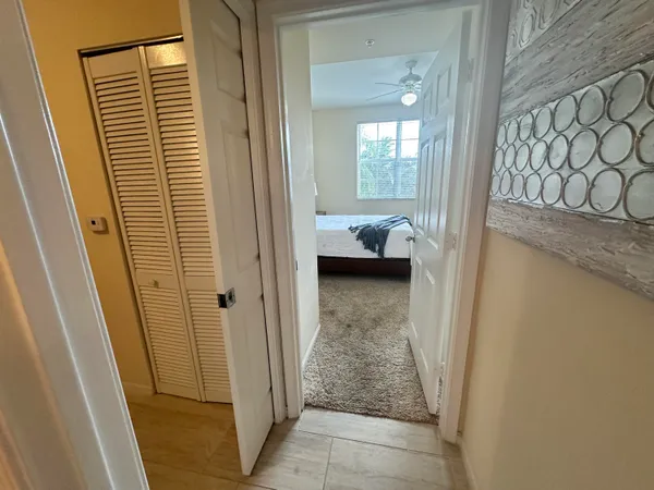 a view of a bathroom from a hallway