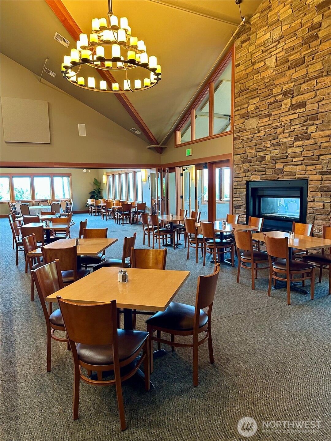 700 East Vine Maple Lane Union, WA 98592 - Photo 7 of 14 a large dining space with furniture a chandelier and window