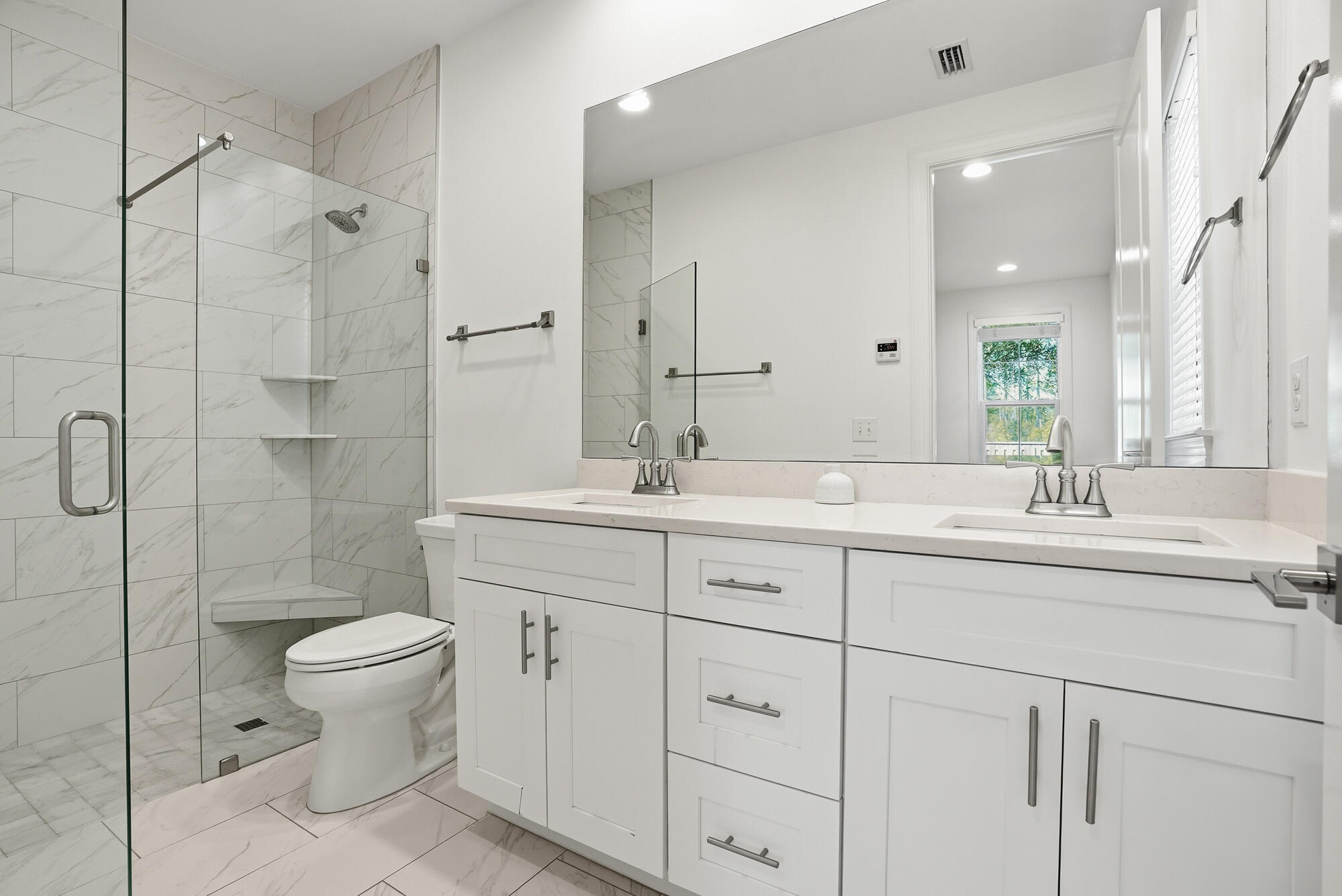 199 Windrow Way Inlet Beach Inlet Beach, FL 32461 - Photo 15 of 24 a bathroom with a double vanity sink toilet and shower