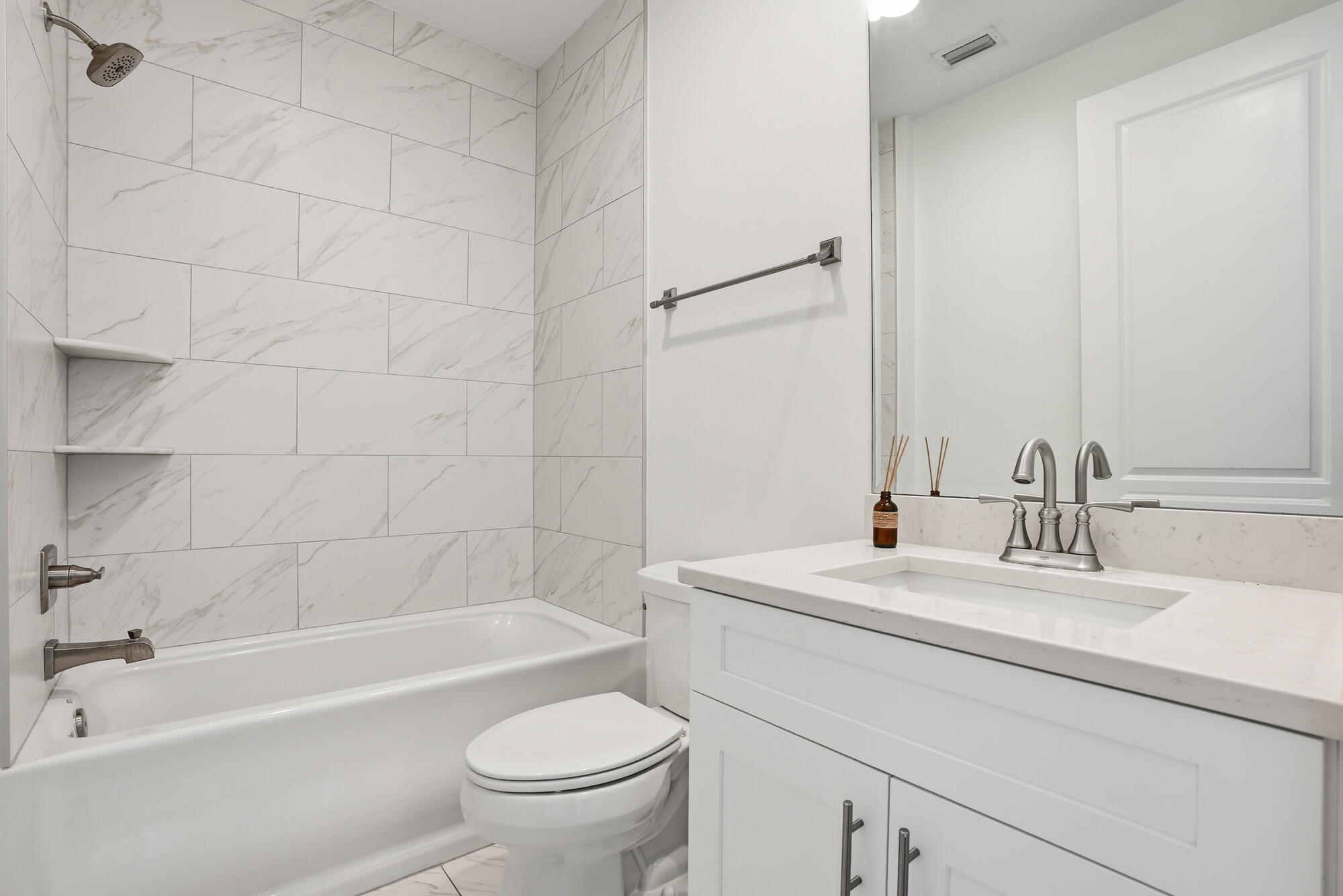 199 Windrow Way Inlet Beach Inlet Beach, FL 32461 - Photo 17 of 24 a bathroom with a bathtub shower sink vanity mirror and toilet
