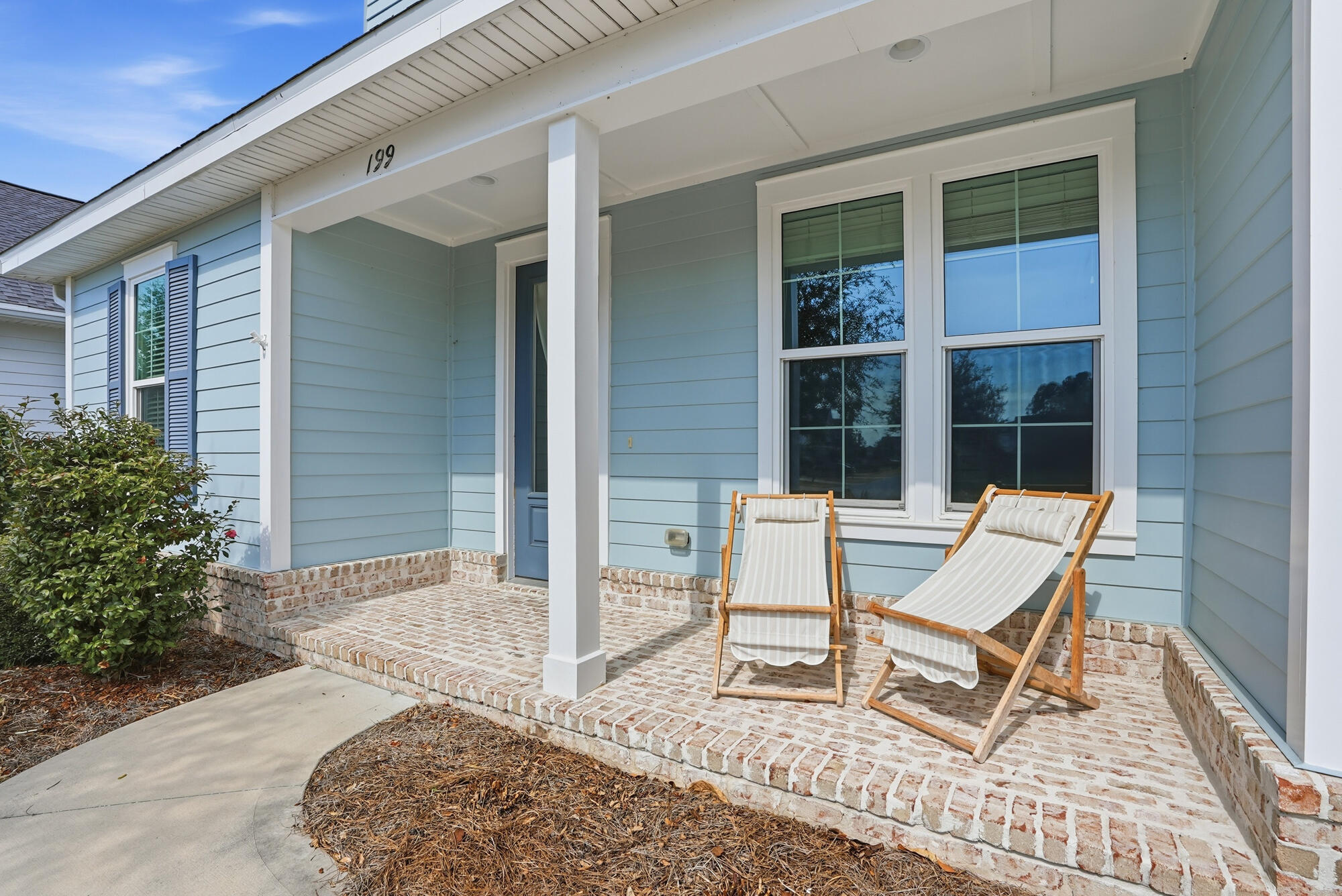 199 Windrow Way Inlet Beach Inlet Beach, FL 32461 - Photo 23 of 24 a view of a house with backyard and sitting area