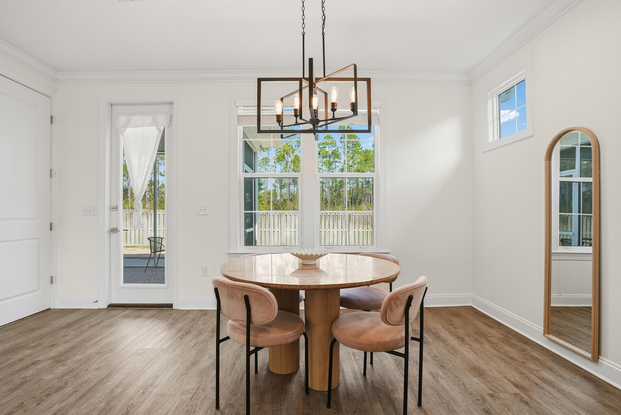 199 Windrow Way Inlet Beach Inlet Beach, FL 32461 - Photo 9 of 24 a view of a dining room with furniture window and wooden floor