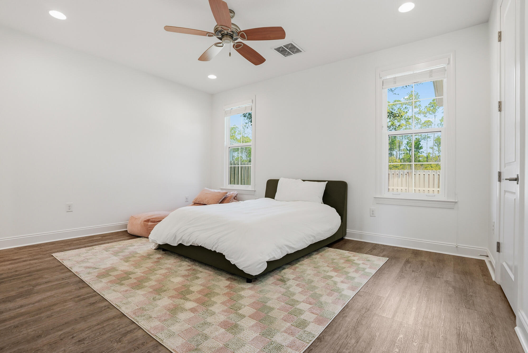 199 Windrow Way Inlet Beach Inlet Beach, FL 32461 - Photo 10 of 24 a bedroom with a bed and wooden floor