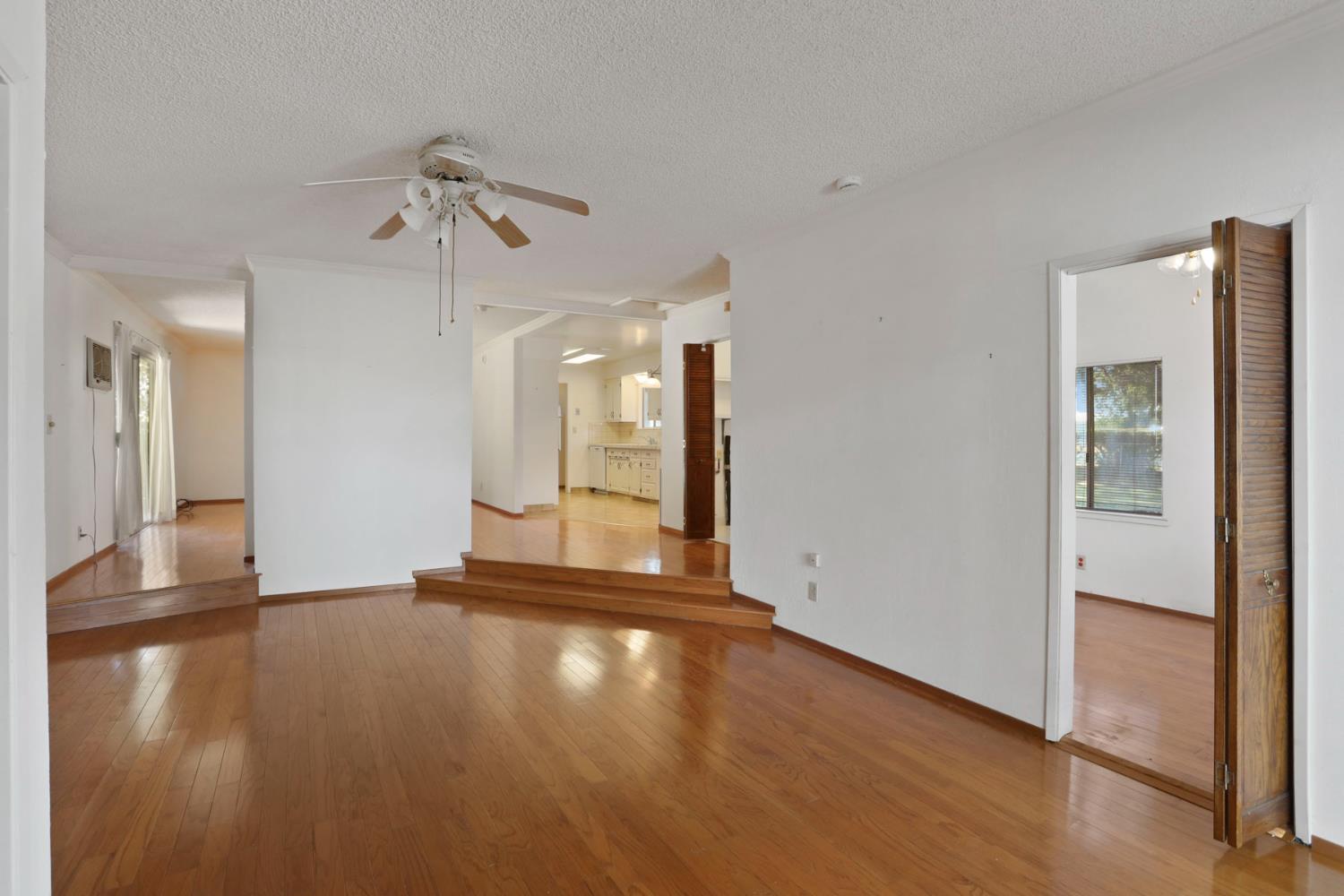 13495 Live Oak Road Lodi, CA 95240 - Photo 24 of 47 a view of a room with wooden floor and a window