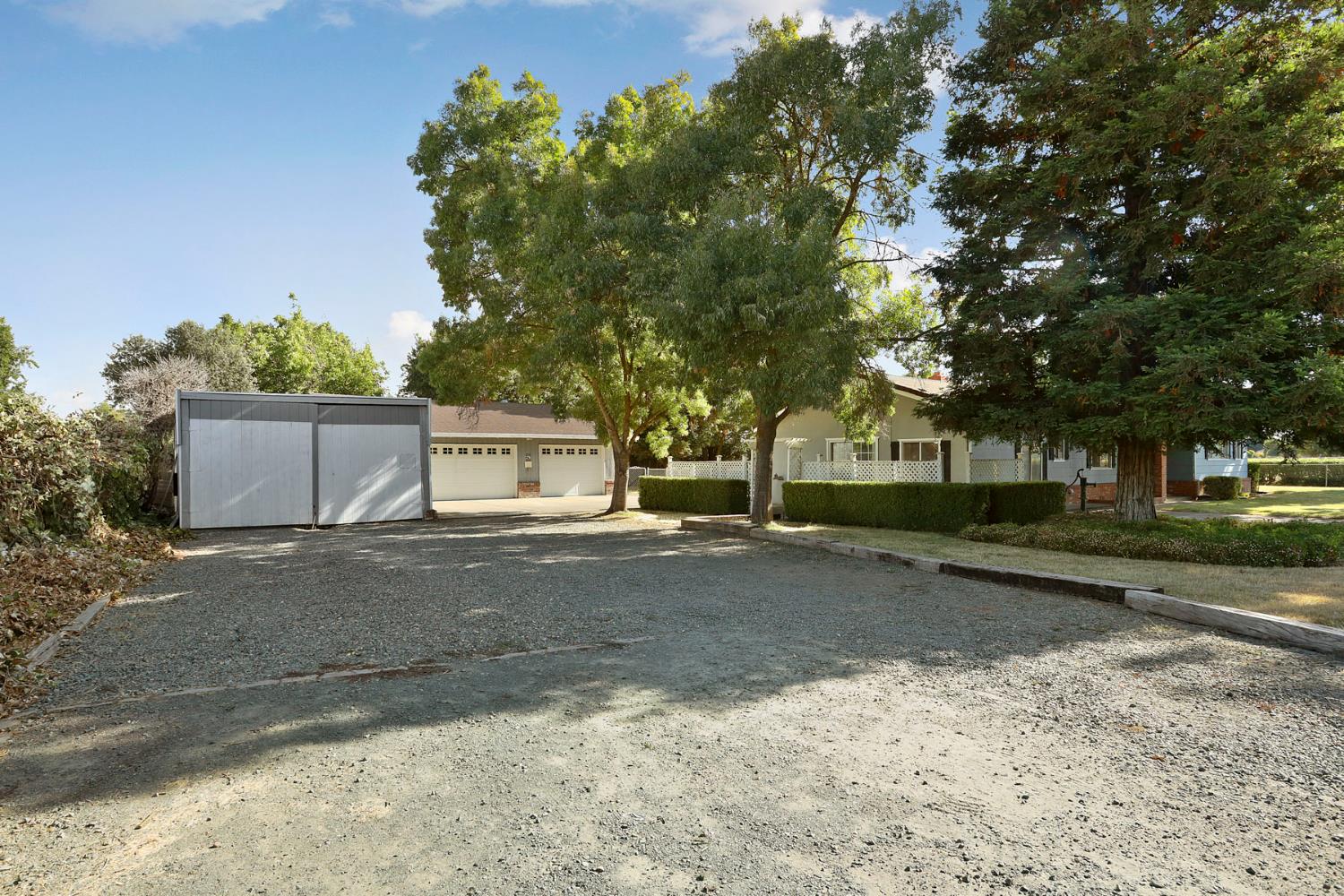 13495 Live Oak Road Lodi, CA 95240 - Photo 6 of 47 a view of a house with a tree