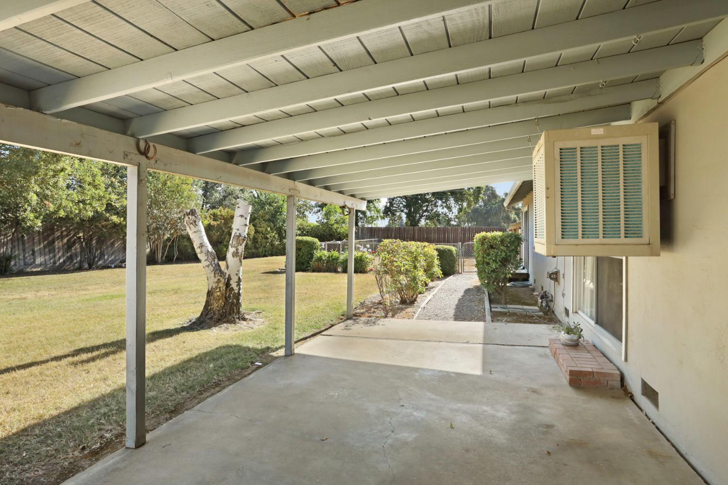 13495 Live Oak Road Lodi, CA 95240 - Photo 9 of 47 a view of a patio with table and chairs
