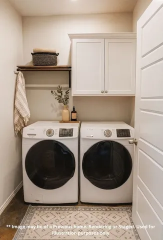 a utility room with sink washer and dryer